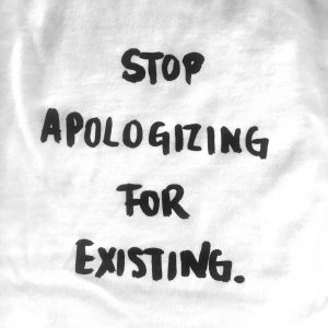 T-Shirt by Milk 'Stop Apologising for Existing'